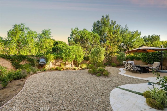 2 Tarascon, Newport Coast, CA 92657 - yard at dusk with a fenced backyard and a patio