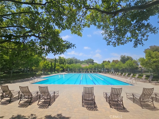 2 Tarascon, Newport Coast, CA 92657 - community pool featuring view of wooded area and a patio