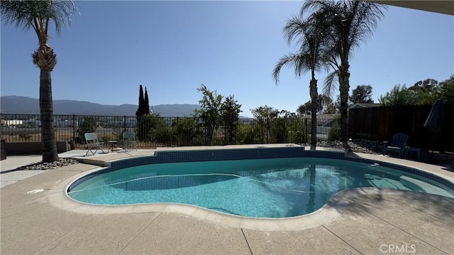 1232 Palos Verde Dr, Corona, CA 92878 - view of pool with a mountain view and a patio
