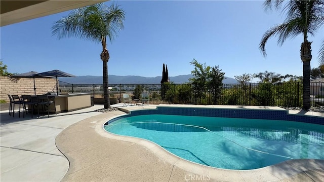 1232 Palos Verde Dr, Corona, CA 92878 - view of pool with a mountain view and a patio area