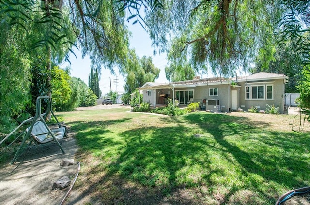 13520 Fenton Ave, Sylmar, CA 91342 - view of green lawn featuring a patio