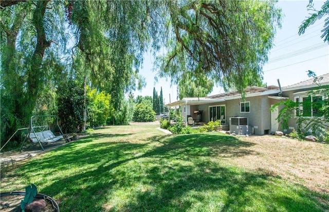 13520 Fenton Ave, Sylmar, CA 91342 - view of grassy yard with a patio