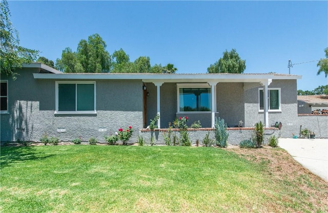 13520 Fenton Ave, Sylmar, CA 91342 - ranch-style house with a front lawn, covered porch, and stucco siding
