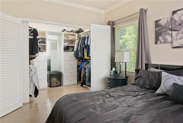 13520 Fenton Ave, Sylmar, CA 91342 - bedroom featuring ornamental molding, wood finished floors, and a closet