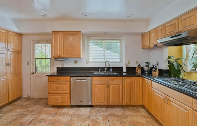 13520 Fenton Ave, Sylmar, CA 91342 - kitchen with appliances with stainless steel finishes, under cabinet range hood, dark stone counters, and recessed lighting