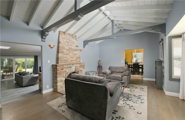 13520 Fenton Ave, Sylmar, CA 91342 - living area featuring wood finished floors, a fireplace, and wooden ceiling