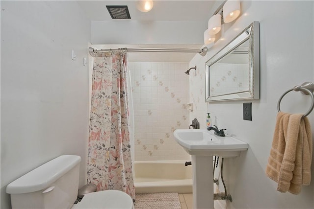 13520 Fenton Ave, Sylmar, CA 91342 - full bath with shower / bath combo with shower curtain and tile patterned floors