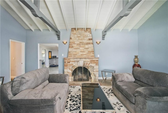 13520 Fenton Ave, Sylmar, CA 91342 - living room featuring a stone fireplace and wood finished floors
