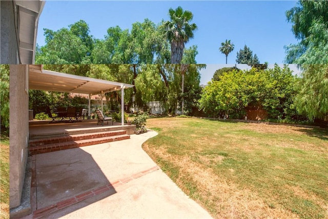 13520 Fenton Ave, Sylmar, CA 91342 - fenced backyard with a patio and view of scattered trees