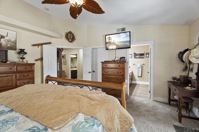 16110 Oak Springs Dr, Ramona, CA 92065 - bedroom featuring light colored carpet, connected bathroom, and a ceiling fan