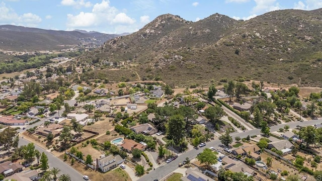 16110 Oak Springs Dr, Ramona, CA 92065 - aerial view of property's location with a mountainous background and nearby suburban area