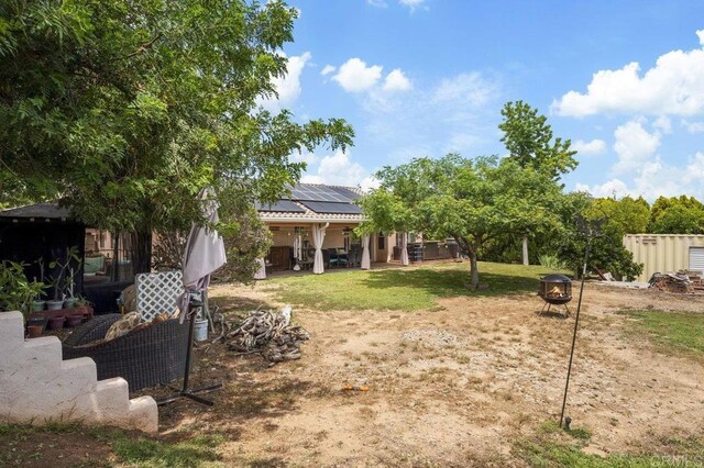 16110 Oak Springs Dr, Ramona, CA 92065 - view of yard with a fire pit and a patio area