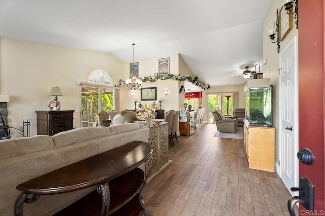 16110 Oak Springs Dr, Ramona, CA 92065 - living room featuring hardwood / wood-style floors, plenty of natural light, vaulted ceiling, a ceiling fan, and a chandelier