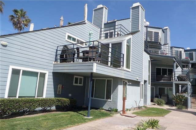 804 N The Strand Unit 7, Oceanside, CA 92054 - view of property exterior with a balcony