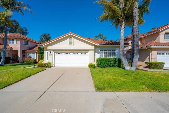 534 Misty View Way, Nipomo, CA 93444 - view of front facade featuring stucco siding, concrete driveway, a front yard, an attached garage, and a tiled roof