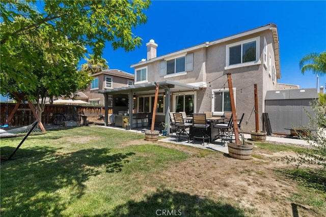4735 Cassiope Ct, Hemet, CA 92545 - rear view of house with a fenced backyard, stucco siding, a patio area, a chimney, and a pergola