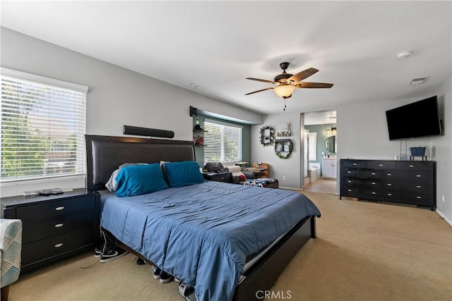 4735 Cassiope Ct, Hemet, CA 92545 - bedroom featuring light carpet, ceiling fan, and connected bathroom