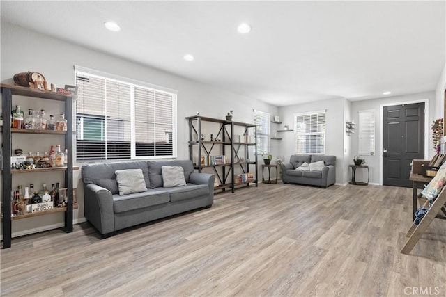 4735 Cassiope Ct, Hemet, CA 92545 - living room featuring light wood-type flooring and recessed lighting