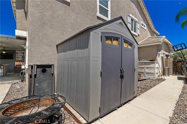 4735 Cassiope Ct, Hemet, CA 92545 - view of home's exterior featuring stucco siding and a storage unit