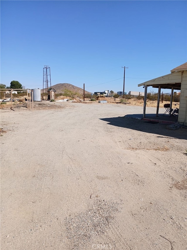 37712 210th St E, Palmdale, CA 93591 - view of yard featuring a mountain view