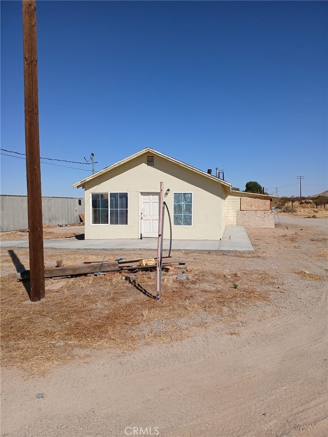 37712 210th St E, Palmdale, CA 93591 - view of front of house featuring stucco siding