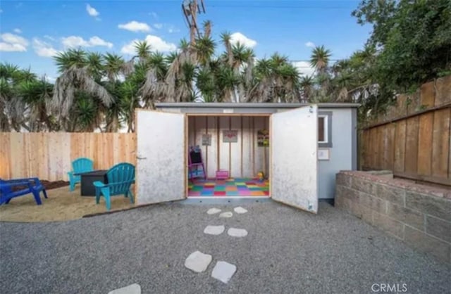 4213 Lonnie St, Oceanside, CA 92056 - view of outbuilding with a fenced backyard