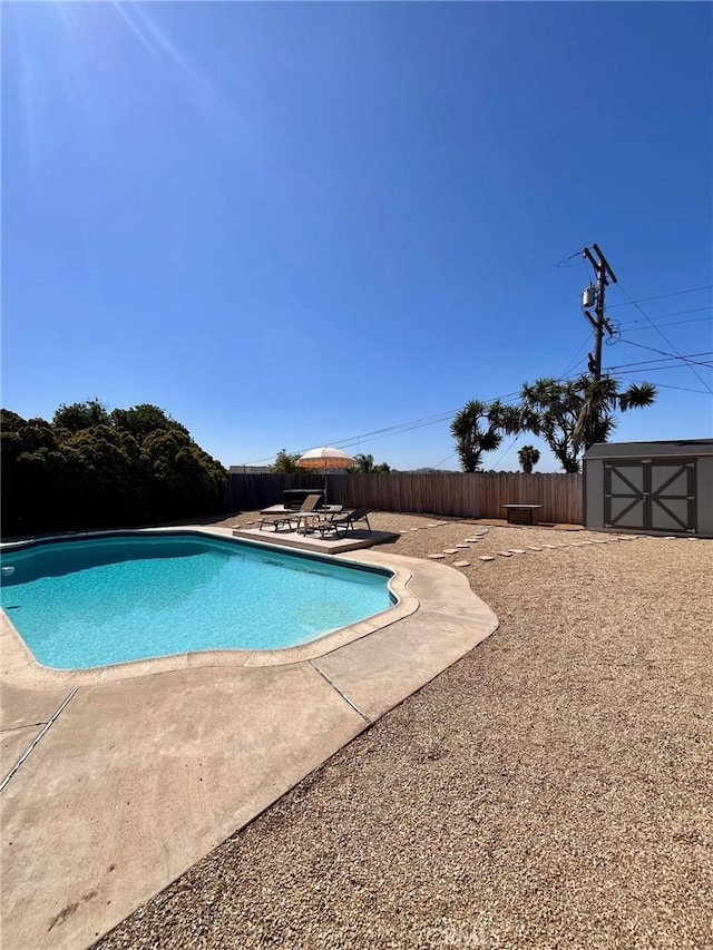 4213 Lonnie St, Oceanside, CA 92056 - view of pool with a fenced backyard, a patio, and a storage shed
