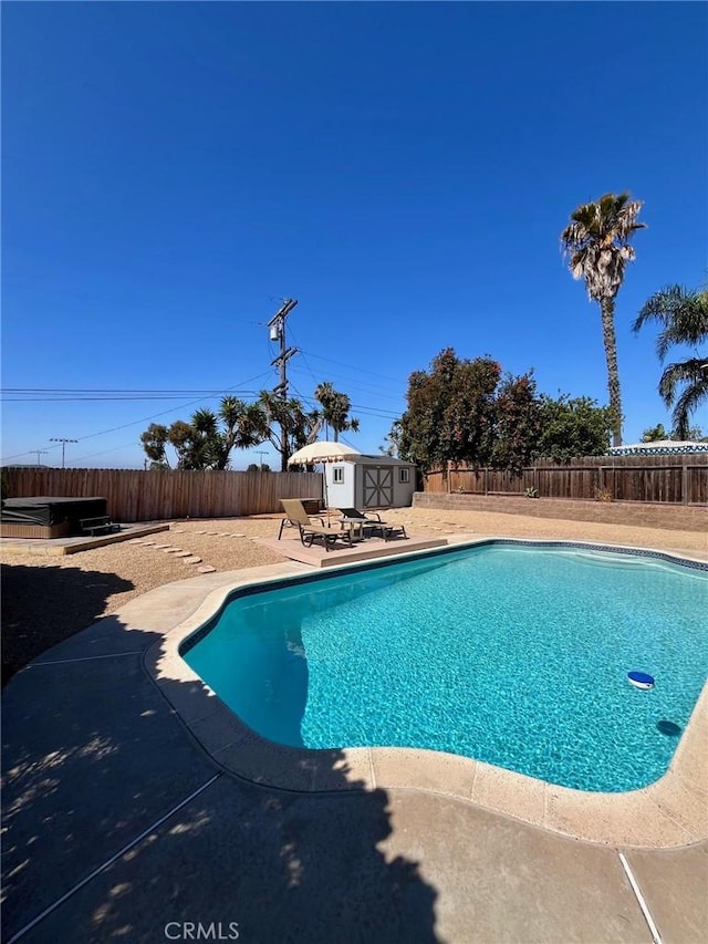 4213 Lonnie St, Oceanside, CA 92056 - view of swimming pool with a patio, a fenced backyard, and a storage unit