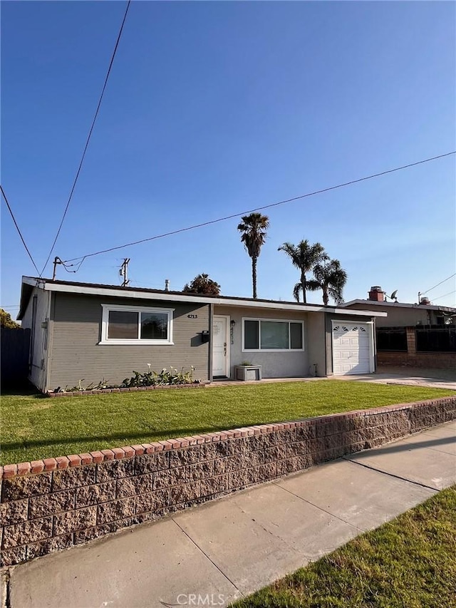 4213 Lonnie St, Oceanside, CA 92056 - single story home with a garage, a front lawn, driveway, and brick siding