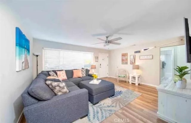 4213 Lonnie St, Oceanside, CA 92056 - living area with a ceiling fan and wood finished floors