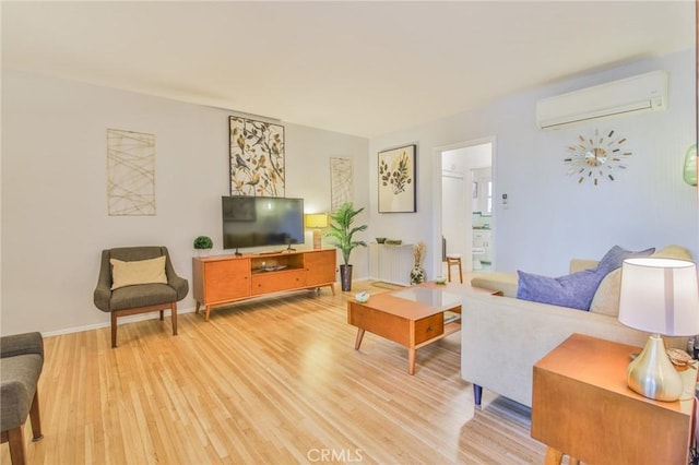 1030 E 2nd St Unit 7, Long Beach, CA 90802 - living room featuring a wall mounted AC, radiator, and light wood-type flooring