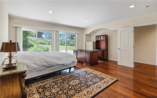 6966 Crest Rd, Rancho Palos Verdes, CA 90275 - bedroom featuring access to exterior, dark wood-type flooring, recessed lighting, and arched walkways