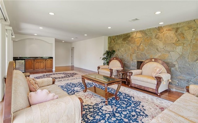 6966 Crest Rd, Rancho Palos Verdes, CA 90275 - living room featuring recessed lighting, a fireplace, wood finished floors, and bar