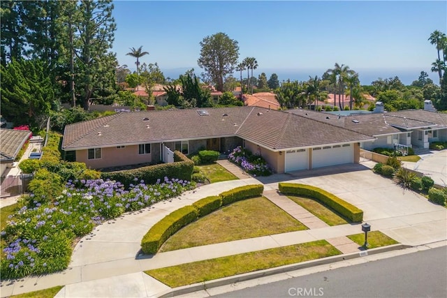 6966 Crest Rd, Rancho Palos Verdes, CA 90275 - view of front facade featuring a garage, concrete driveway, a tiled roof, and stucco siding