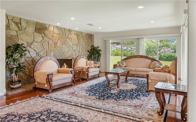 6966 Crest Rd, Rancho Palos Verdes, CA 90275 - sitting room featuring wood finished floors, recessed lighting, and a stone fireplace