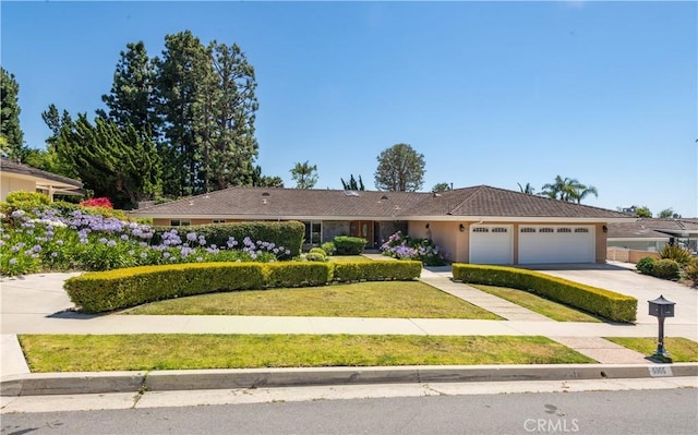 6966 Crest Rd, Rancho Palos Verdes, CA 90275 - ranch-style home featuring driveway, an attached garage, a front lawn, and stucco siding