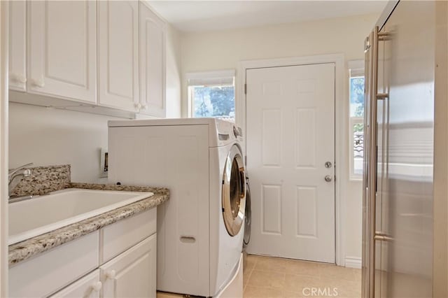 6966 Crest Rd, Rancho Palos Verdes, CA 90275 - laundry area featuring cabinet space, light tile patterned floors, and independent washer and dryer