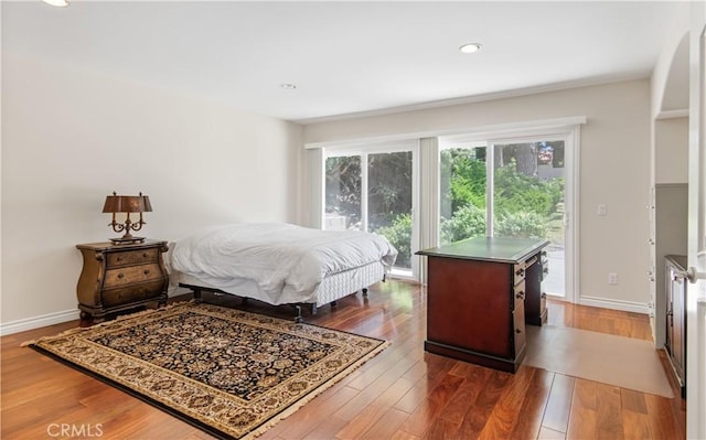 6966 Crest Rd, Rancho Palos Verdes, CA 90275 - bedroom featuring wood finished floors, access to exterior, and recessed lighting