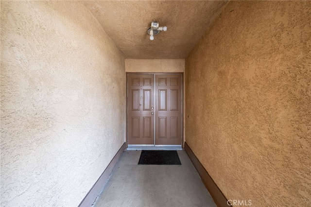 43922 Warner Trl, Palm Desert, CA 92211 - property entrance featuring stucco siding