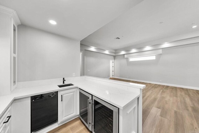 6082 Highland Ave, Yorba Linda, CA 92886 - indoor bar with black dishwasher, light wood finished floors, beverage cooler, and recessed lighting