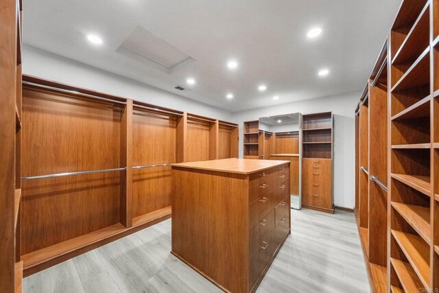 6082 Highland Ave, Yorba Linda, CA 92886 - walk in closet featuring attic access and light wood finished floors