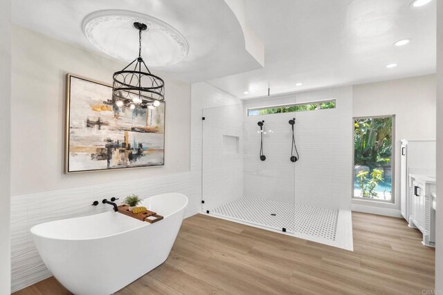 6082 Highland Ave, Yorba Linda, CA 92886 - full bath featuring walk in shower, a freestanding tub, tile walls, recessed lighting, and a chandelier