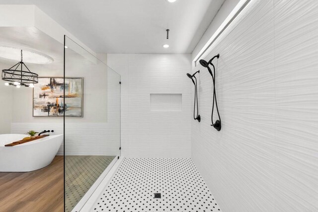 6082 Highland Ave, Yorba Linda, CA 92886 - bathroom featuring a walk in shower, a freestanding tub, a chandelier, and recessed lighting