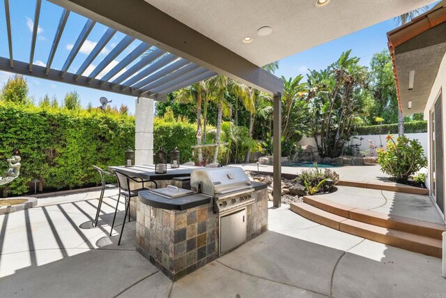 6082 Highland Ave, Yorba Linda, CA 92886 - fenced backyard featuring exterior kitchen, a patio area, and a pergola