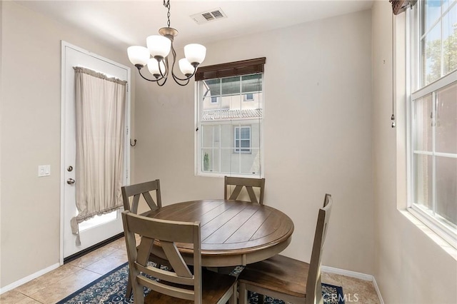 31186 Lavender Ct Unit 164, Temecula, CA 92592 - dining area featuring a chandelier, healthy amount of natural light, and light tile patterned flooring