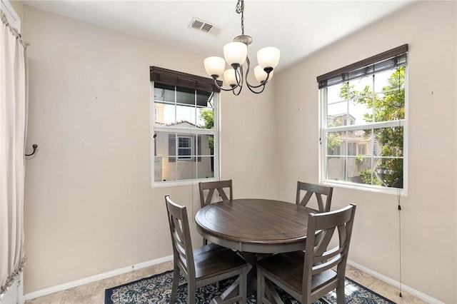 31186 Lavender Ct Unit 164, Temecula, CA 92592 - dining room featuring healthy amount of natural light, a chandelier, and light tile patterned floors