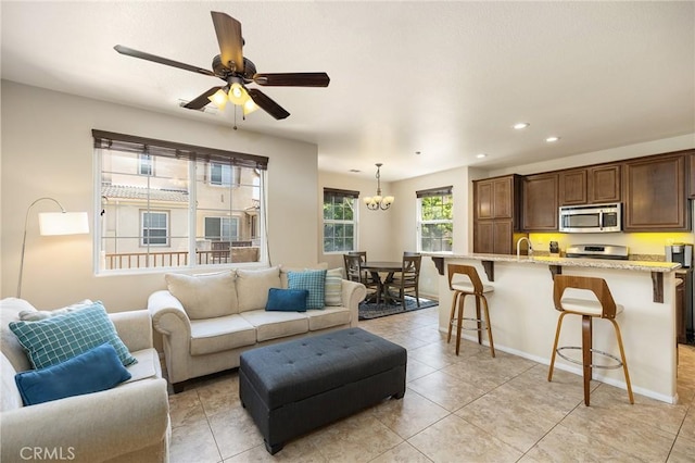 31186 Lavender Ct Unit 164, Temecula, CA 92592 - living room featuring a chandelier, recessed lighting, light tile patterned floors, and ceiling fan