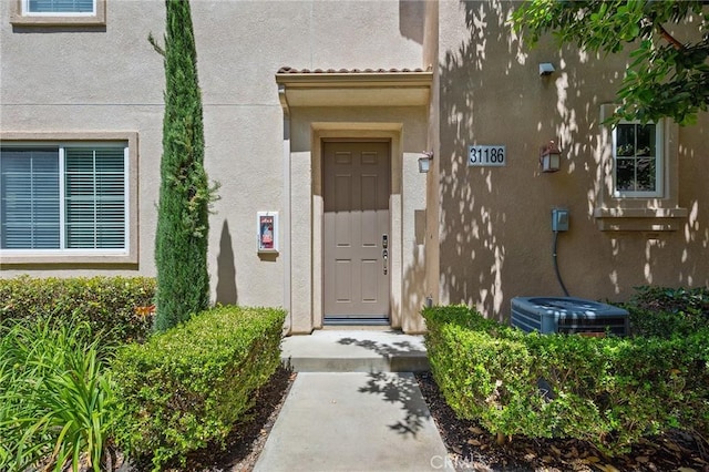 31186 Lavender Ct Unit 164, Temecula, CA 92592 - view of exterior entry with stucco siding