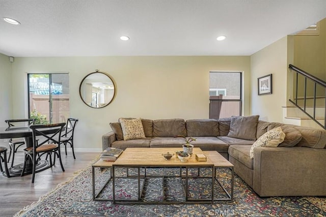 3931 Cottonwood Grove Trl, Calabasas, CA 91301 - living area with wood finished floors, recessed lighting, and stairs
