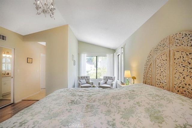 3931 Cottonwood Grove Trl, Calabasas, CA 91301 - bedroom with lofted ceiling, wood finished floors, and a chandelier